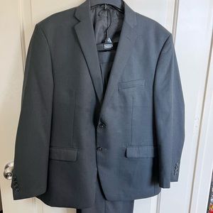 Van Huesen suit separates being sold as set. Charcoal size 44s and 38 pants.